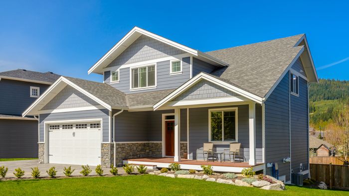 A typical, albeit attractive, house in a suburban neighborhood.