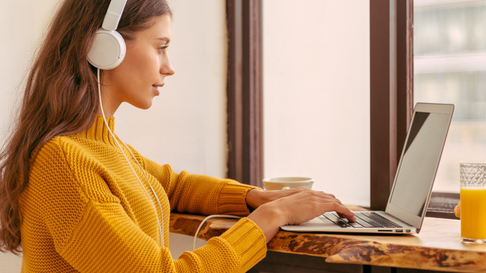 Freelancer working remotely on laptop