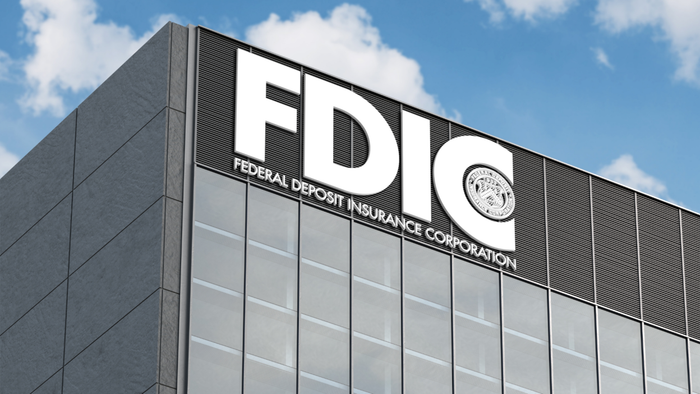 The Federal Deposit Insurance Corporation (FDIC) emblem displayed atop a glass building.