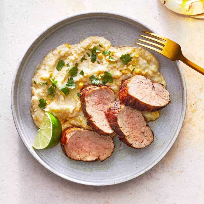 The secret to perfectly tender pork tenderloin lies in starting with a simple marinade, searing the pork until golden brown on all sides, and then finishing the cooking process in the oven.