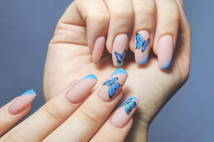 A beautiful butterfly-inspired manicure.