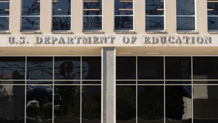 In front of the U.S. Department of Education Office