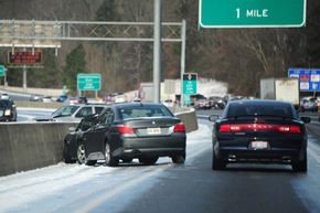 Cars navigating icy roads in Atlanta, January 2014