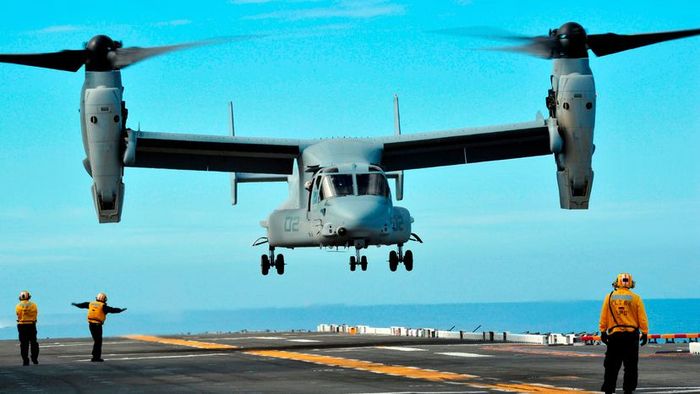 A U.S. Marine Corps MV-22 Osprey aircraft readies itself for landing.