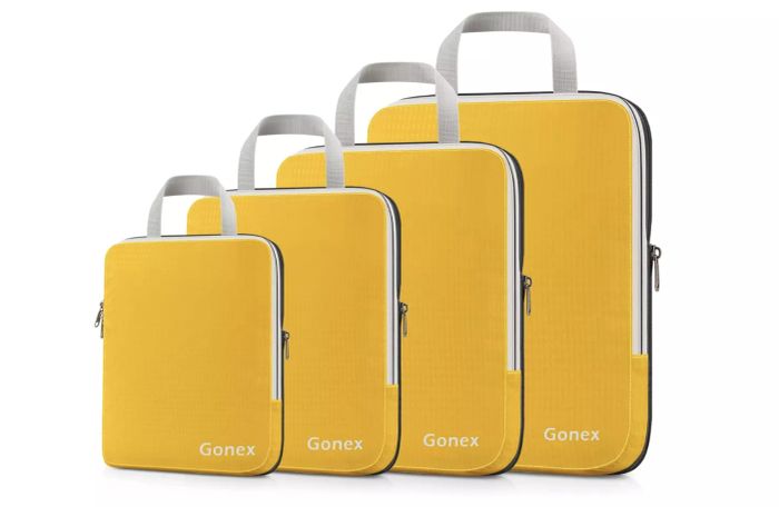 four yellow packing cubes