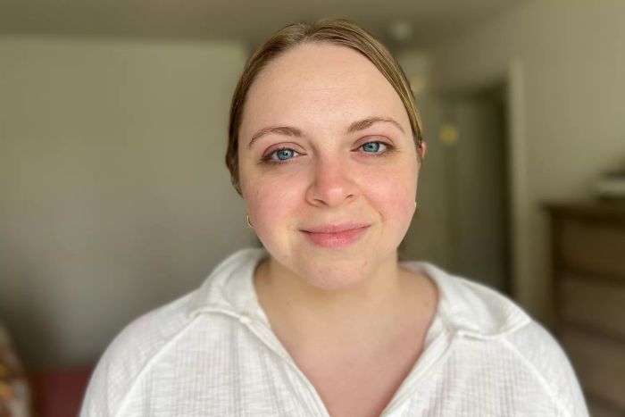 A person after applying SkinCeuticals Physical Fusion UV Defense SPF 50 to their skin