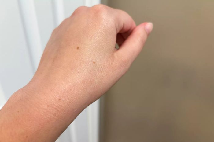 A hand after applying Kinfield Sunglow SPF 35