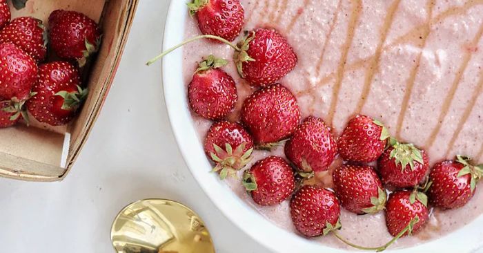 Prepare yourself for a new breakfast obsession with this Strawberry-Cauliflower Smoothie Bowl. It's a game changer.