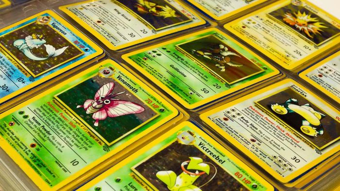 A collection of Pokémon cards neatly arranged in a binder for viewing and trading.