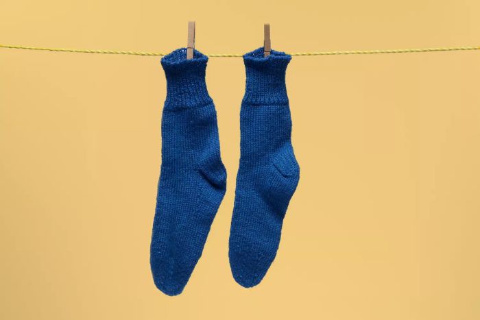 socks neatly hung on a clothesline