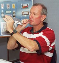 Astronaut Brian Duffy, commander of the STS-92 mission, enjoys a refreshing orange drink during his time at the JSC.