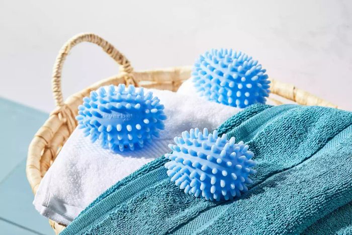 Nellie's Dryerballs displayed in a woven basket.