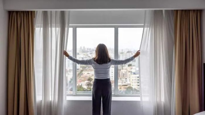 While you can adjust the curtains, opening the windows is usually not an option in most hotel rooms.