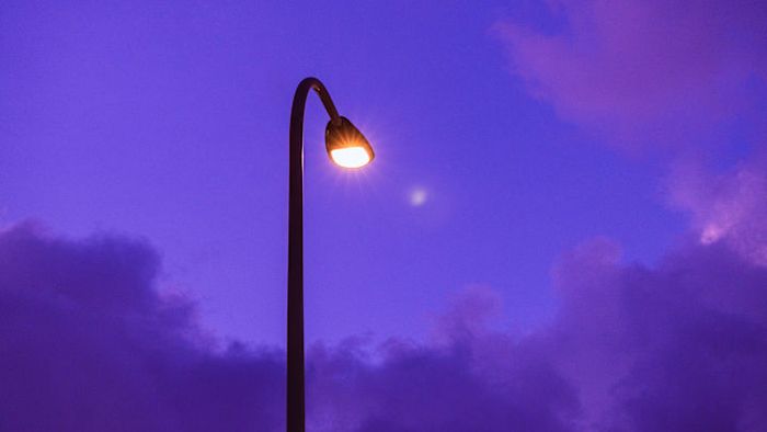Streetlights aren't supposed to emit a purple glow.