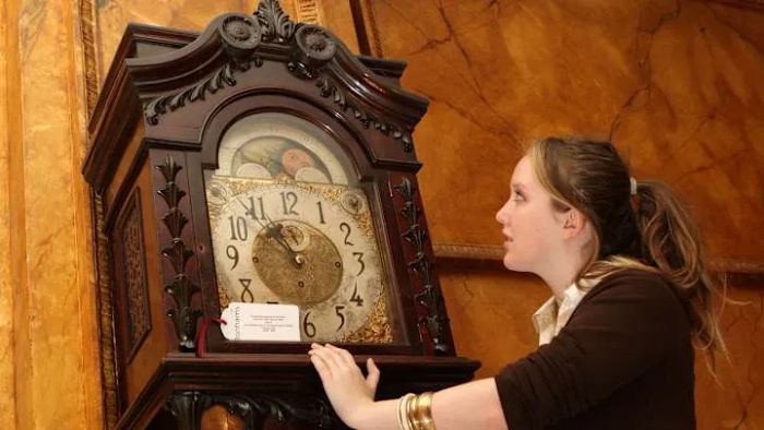 Grandfather clocks are often passed down through generations, becoming treasured family heirlooms.