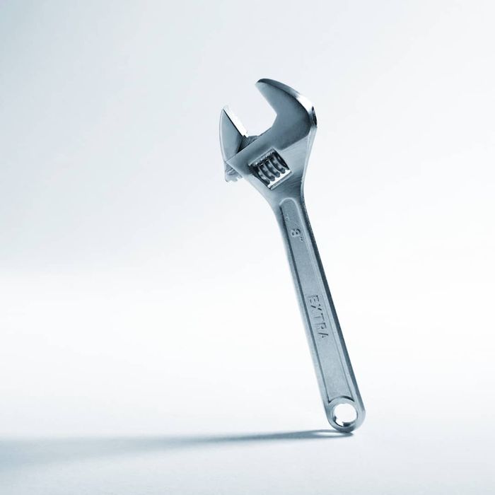 An image of a crescent wrench is shown