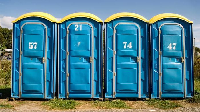 Cleaning a porta potty is far from easy work.