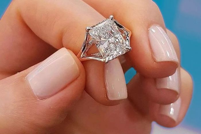 A wedding ring worn on the index finger.