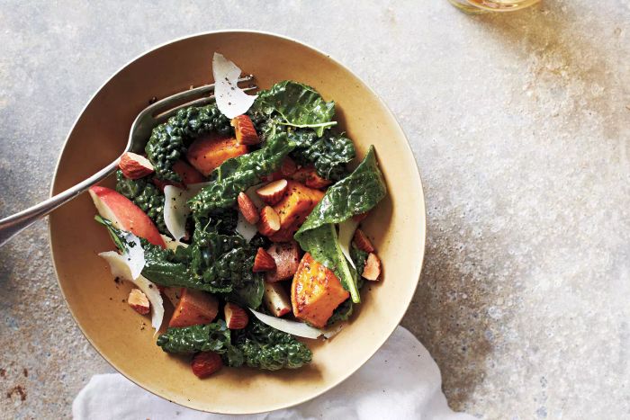 A tangy and hearty salad made with kale, roasted sweet potatoes, and fresh apples, all dressed in a mustard-based vinaigrette, this dish offers a delicious and vibrant combination of flavors.