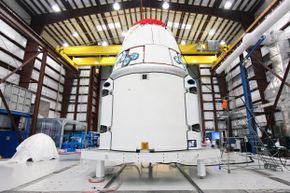 Dragon capsule resting in the hangar