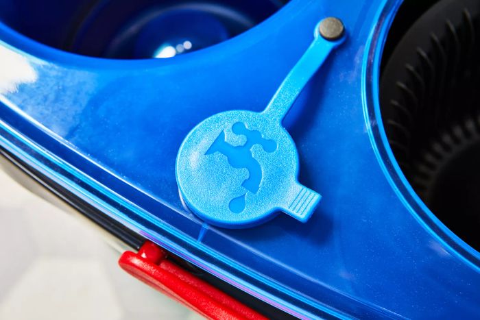 A close-up of the water plug on the O-Cedar EasyWring RinseClean Spin Mop & Bucket System