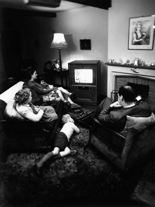 Family Enjoying Television