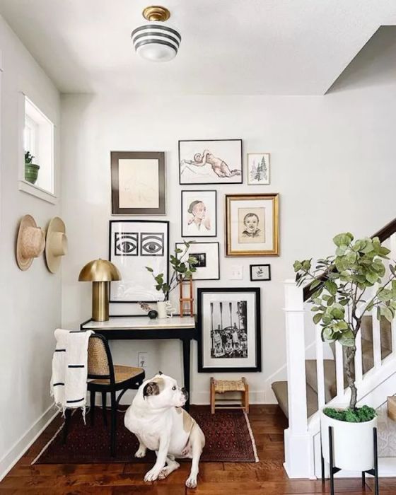 Entryway with a Neutral Color Gallery Wall and Small Desk