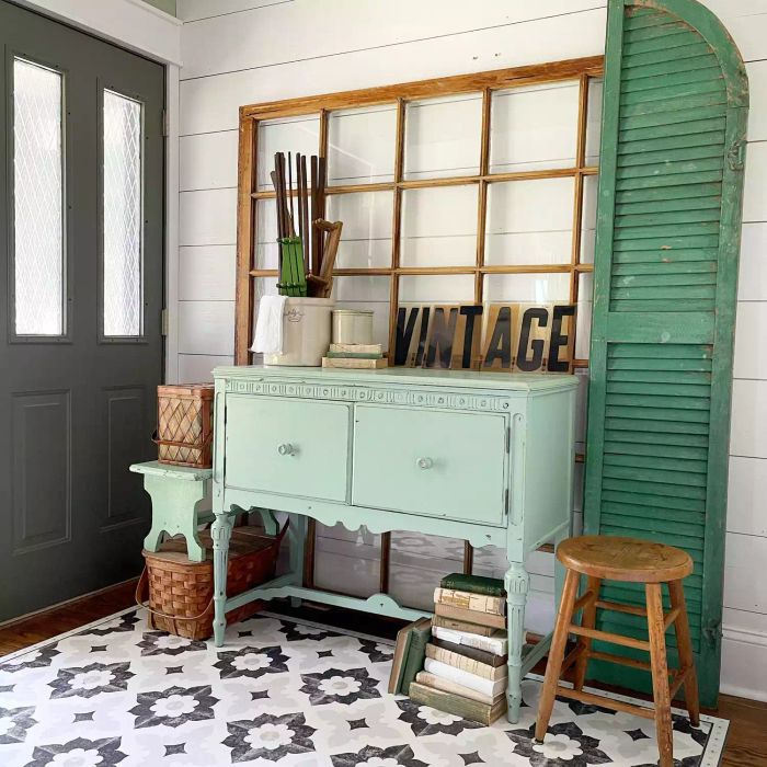 Entryway Featuring Vintage Green Decor, Storage Cabinet, Window Panes, and Shutters