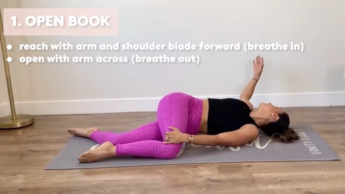 Physical Therapist Demonstrating Stretches for Upper Back Pain: Open book stretch for the upper back