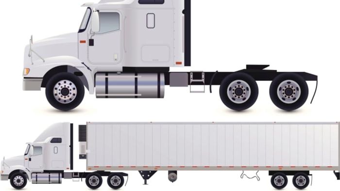 The tractor sits above; the semi-trailer is attached beneath it.