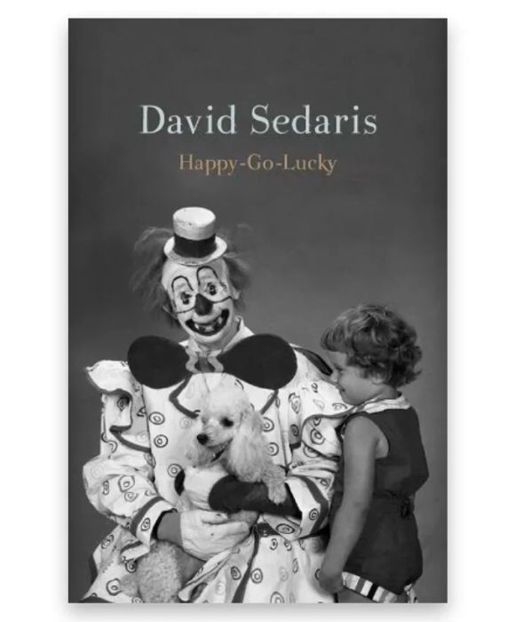 Black and white image of a clown with a child and a poodle dog on the cover of Happy-Go-Lucky by David Sedaris