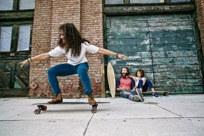 Family skateboarding together