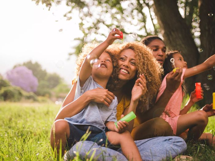 Family Blowing Bubbles