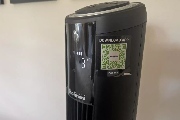 A QR code on the side of the HOLMES 42 Inch SmartConnect WI-FI Digital Tower Fan that directs users to download the companion app
