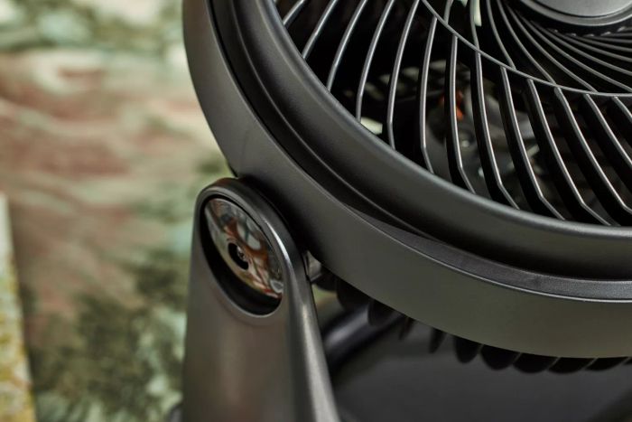 Close-up view of the hinges on the Hampton Bay 3-Speed Personal High Velocity Table Fan