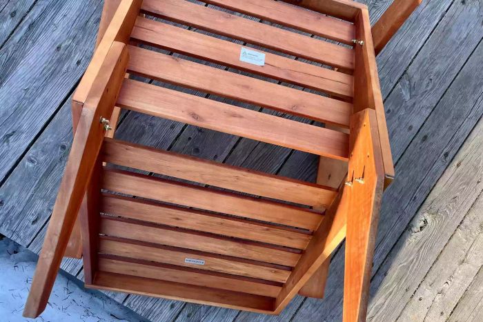 The underside view of the Joss & Main Ursa Acacia Outdoor Adirondack Chair.