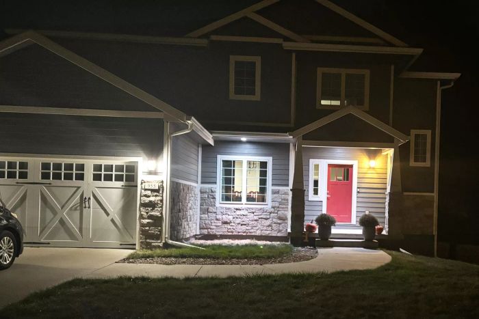 The GE CYNC Smart Outdoor Flood Light Bulb is powered on and shining bright