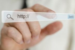 Person typing on an http:// address bar
