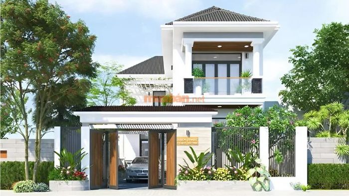 Nhà vườn 2 tầng mái thái với thiết kế cổng đơn giản, tinh tế.