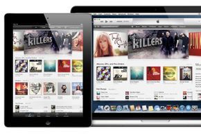 iTunes content displayed on a MacBook and tablet.