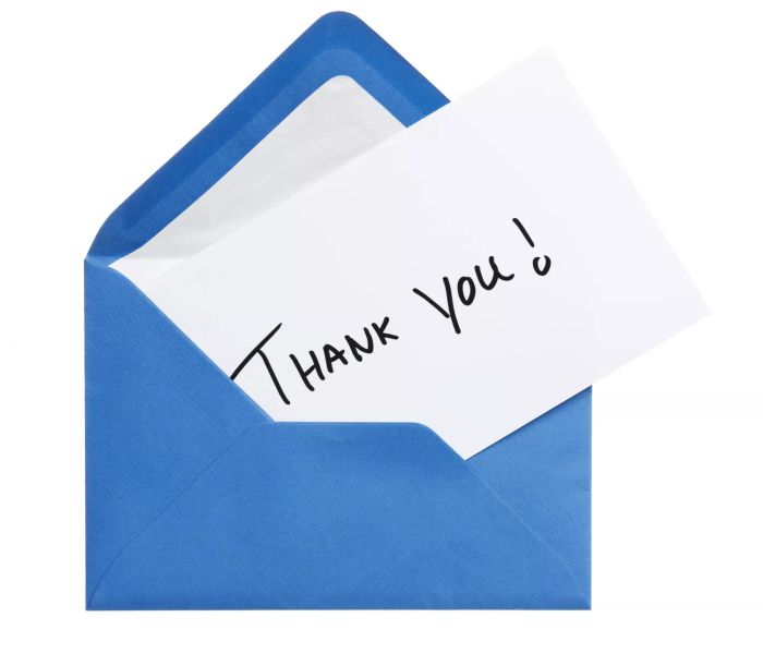 Image: A thank-you note in a blue envelope
