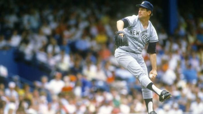 The famous southpaw Tommy John pitching for the New York Yankees during the 1980s.