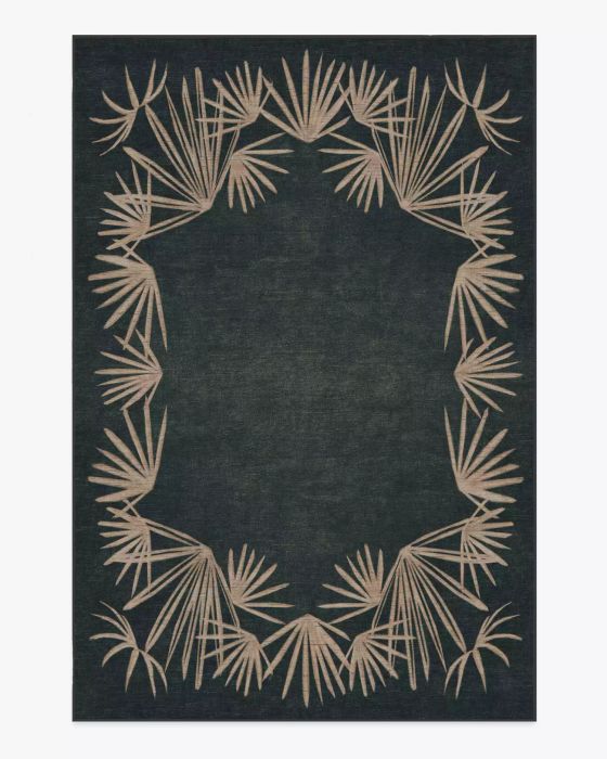 A rug featuring a border design of palm fronds.