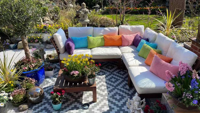 how-to-clean-outdoor-cushions-GettyImages-1389689635