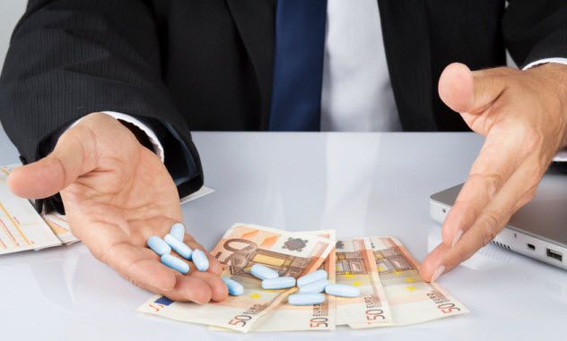 3a-pills-and-money_47885334_SMALL