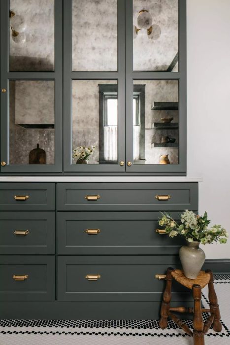 mirrors on cabinet green white kitchen