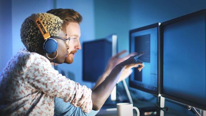 Software engineers working to resolve issues.