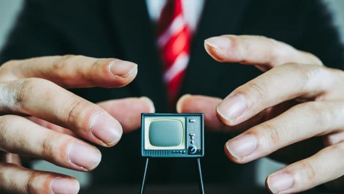 What is the significance of a politician giving their approval for a message in a campaign commercial?