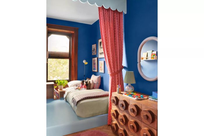 A lively and vibrant kids bedroom featuring bold colors and whimsical designs