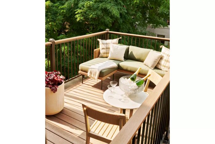 A spacious outdoor backyard with a decked area